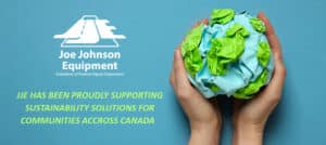 A graphic emphasizing JJE's support to sustainability solutions with an image of two hands holding a blue and green paper sphere to symbolize earth. 